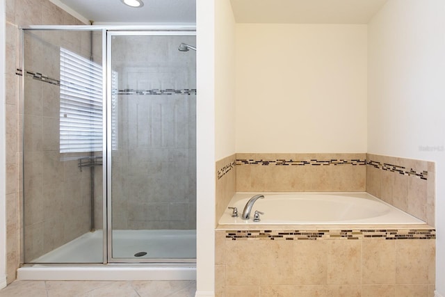 563 Copperdale Ave, Winter Garden, FL 34787 - bathroom with a stall shower and a bath