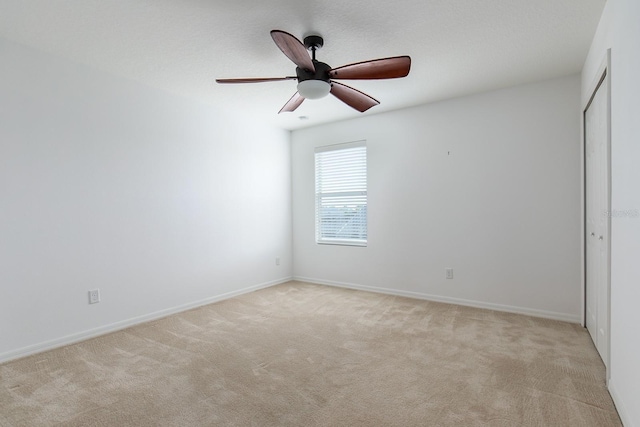 563 Copperdale Ave, Winter Garden, FL 34787 - unfurnished room featuring light carpet, baseboards, and ceiling fan