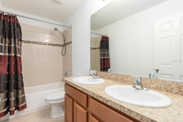 563 Copperdale Ave, Winter Garden, FL 34787 - bathroom featuring tile patterned flooring, a sink, toilet, and shower / bathtub combination with curtain