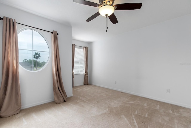563 Copperdale Ave, Winter Garden, FL 34787 - spare room with baseboards, light colored carpet, and ceiling fan