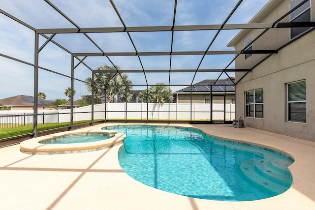 563 Copperdale Ave, Winter Garden, FL 34787 - view of pool featuring a patio area, a pool with connected hot tub, glass enclosure, and fence