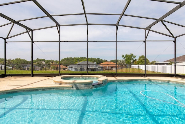 563 Copperdale Ave, Winter Garden, FL 34787 - view of pool featuring glass enclosure, fence, a pool with connected hot tub, and a patio