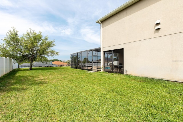 563 Copperdale Ave, Winter Garden, FL 34787 - view of yard featuring a lanai and fence