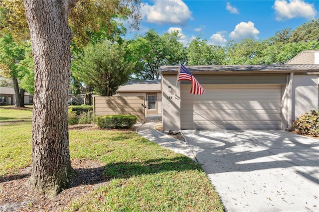 218 Nettlewood Ln, Fern Park, FL 32730 - view of front of house featuring stucco siding, driveway, a front yard, a garage, and a shingled roof