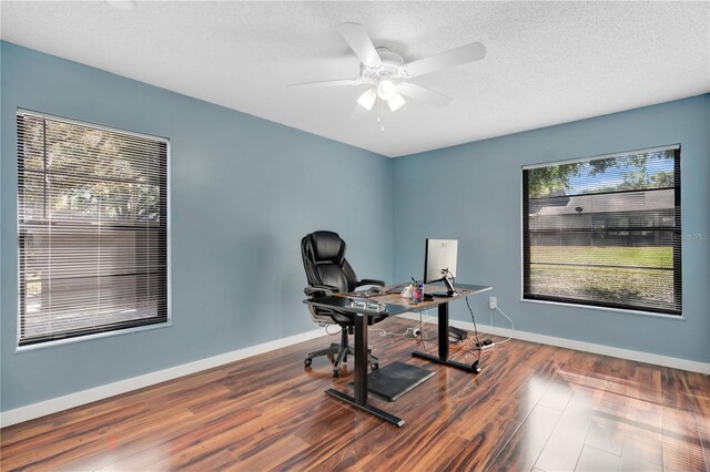 218 Nettlewood Ln, Fern Park, FL 32730 - home office with a textured ceiling, baseboards, ceiling fan, and wood finished floors