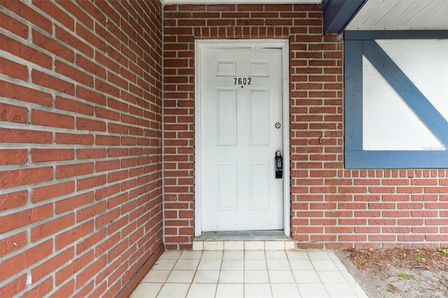7602 Glenmoor Ln, Winter Park, FL 32792 - property entrance featuring brick siding