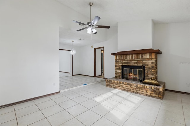 7602 Glenmoor Ln, Winter Park, FL 32792 - unfurnished living room featuring a brick fireplace, lofted ceiling, baseboards, tile patterned floors, and a ceiling fan