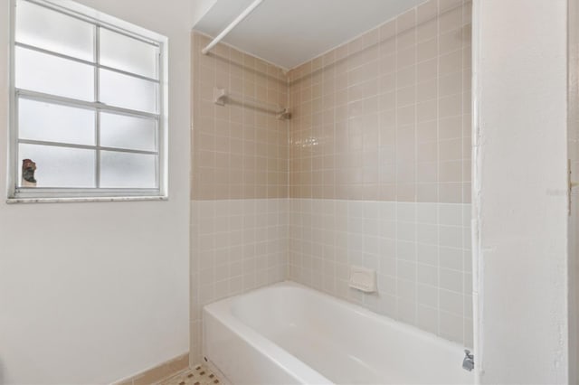 7602 Glenmoor Ln, Winter Park, FL 32792 - full bathroom with baseboards, bathing tub / shower combination, and tile patterned flooring