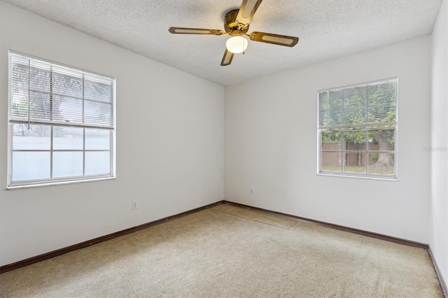 7602 Glenmoor Ln, Winter Park, FL 32792 - carpeted empty room featuring baseboards, a ceiling fan, and a textured ceiling
