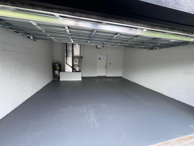 54 Malauka Trak, Ocklawaha, FL 32179 - garage featuring water heater