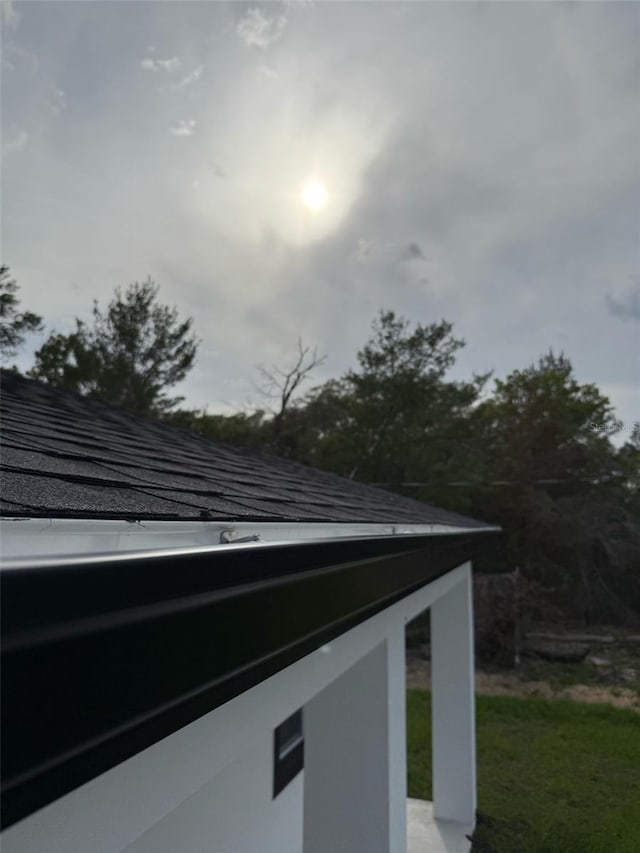 54 Malauka Trak, Ocklawaha, FL 32179 - details featuring roof with shingles
