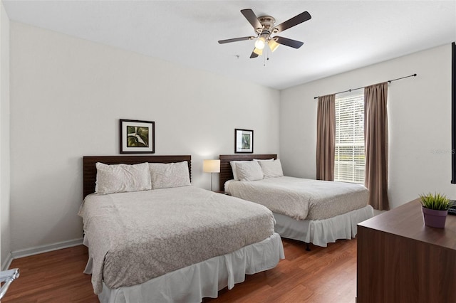 4114 Breakview Dr Unit 11002, Orlando, FL 32819 - bedroom with baseboards, wood finished floors, and ceiling fan
