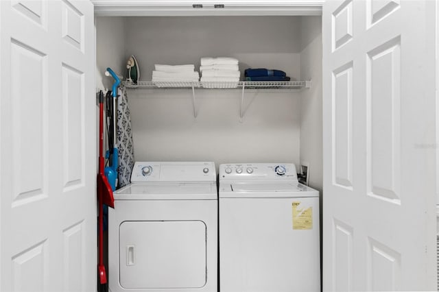 4114 Breakview Dr Unit 11002, Orlando, FL 32819 - laundry area featuring washing machine and dryer and laundry area
