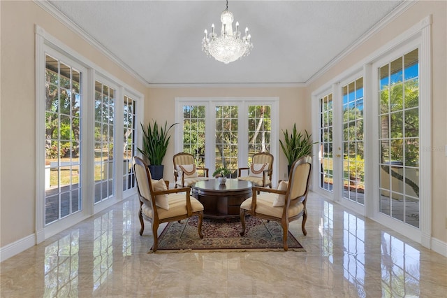 2910 Frontier Dr, Kissimmee, FL 34744 - sunroom / solarium featuring crown molding, an inviting chandelier, french doors, marble finish floor, and baseboards