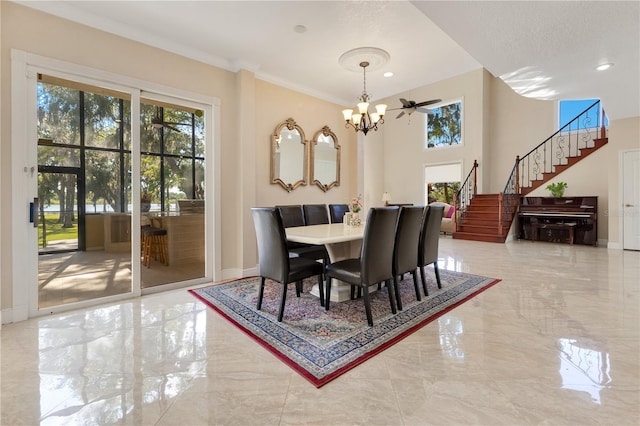 2910 Frontier Dr, Kissimmee, FL 34744 - dining room featuring stairway, a notable chandelier, baseboards, and marble finish floor