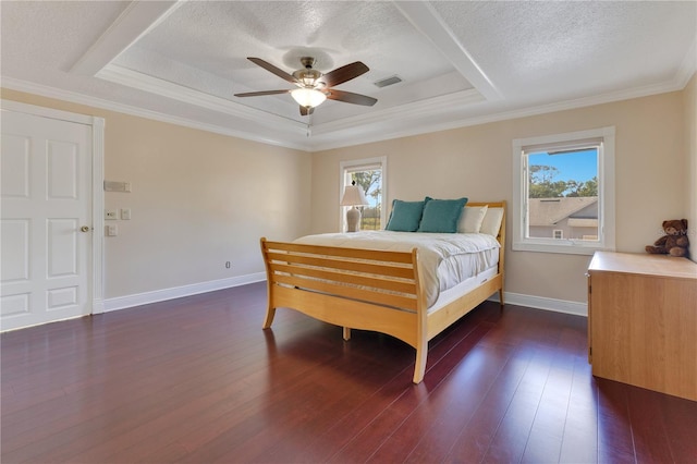 2910 Frontier Dr, Kissimmee, FL 34744 - bedroom featuring visible vents, crown molding, dark wood-style floors, a textured ceiling, and a raised ceiling