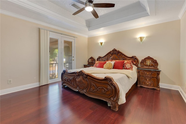 2910 Frontier Dr, Kissimmee, FL 34744 - bedroom with a raised ceiling, ornamental molding, wood finished floors, and access to exterior