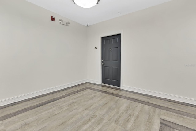 5550 E Michigan St Unit 3325, Orlando, FL 32822 - empty room featuring baseboards and wood finished floors