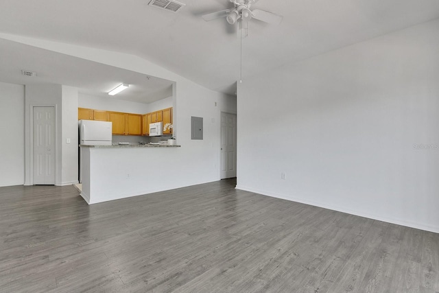 5550 E Michigan St Unit 3325, Orlando, FL 32822 - unfurnished living room with a ceiling fan, wood finished floors, vaulted ceiling, and visible vents