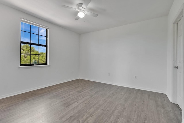 5550 E Michigan St Unit 3325, Orlando, FL 32822 - unfurnished room featuring a ceiling fan, baseboards, and wood finished floors