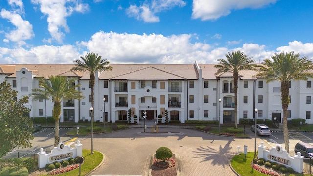 5550 E Michigan St Unit 3325, Orlando, FL 32822 - view of building exterior featuring uncovered parking