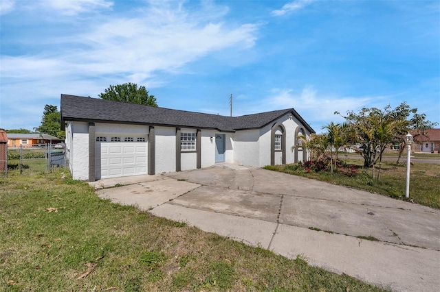 4066 Vanet Ct, Orlando, FL 32822 - garage featuring fence and concrete driveway