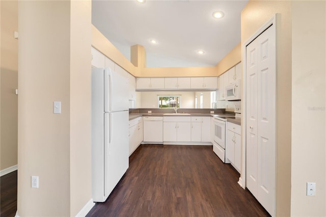 kitchen featuring a sink, white cabinetry, lofted ceiling, white appliances, and dark wood-style flooring