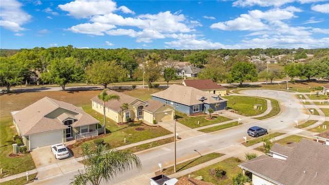 drone / aerial view featuring a residential view
