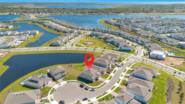 13231 Panama Beach Ct, Orlando, FL 32827 - aerial view of property's location with nearby suburban area and a large body of water