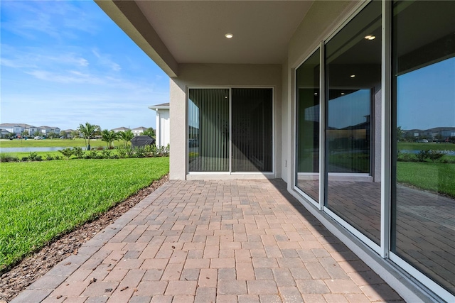 13231 Panama Beach Ct, Orlando, FL 32827 - view of patio featuring a water view and a residential view