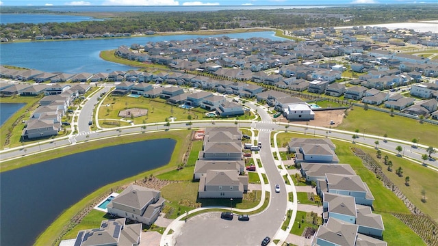 13231 Panama Beach Ct, Orlando, FL 32827 - aerial view of property and surrounding area featuring nearby suburban area and a large body of water