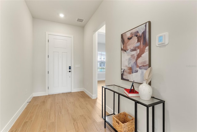 13231 Panama Beach Ct, Orlando, FL 32827 - foyer entrance with light wood-style floors, baseboards, and recessed lighting