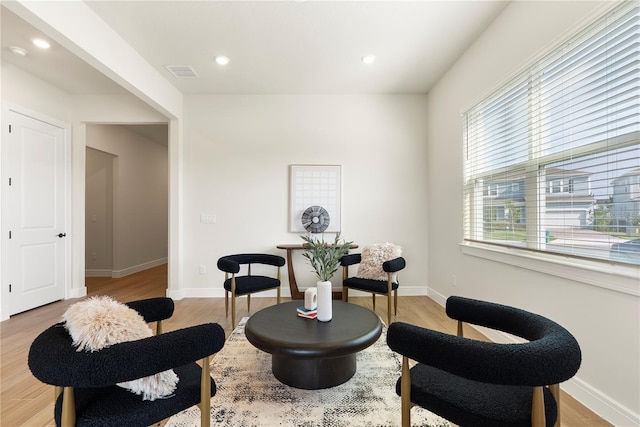 13231 Panama Beach Ct, Orlando, FL 32827 - sitting room with light wood-style floors, baseboards, and recessed lighting