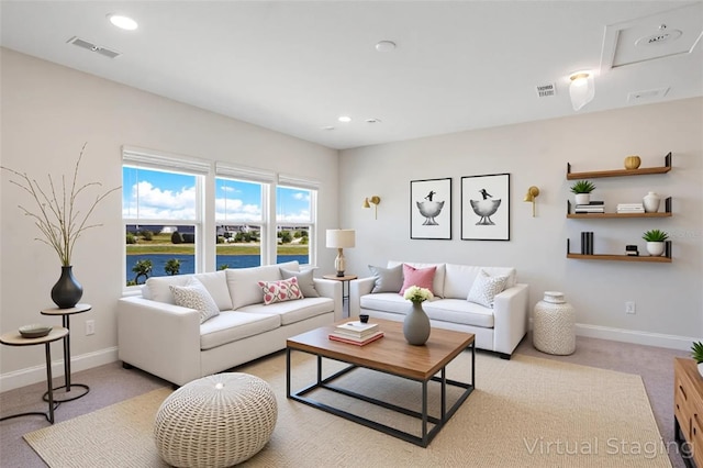 13231 Panama Beach Ct, Orlando, FL 32827 - carpeted living room with baseboards and recessed lighting