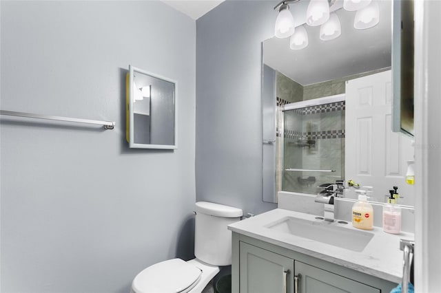 103 Nassau Pl, Kissimmee, FL 34758 - bathroom with toilet, a stall shower, and vanity