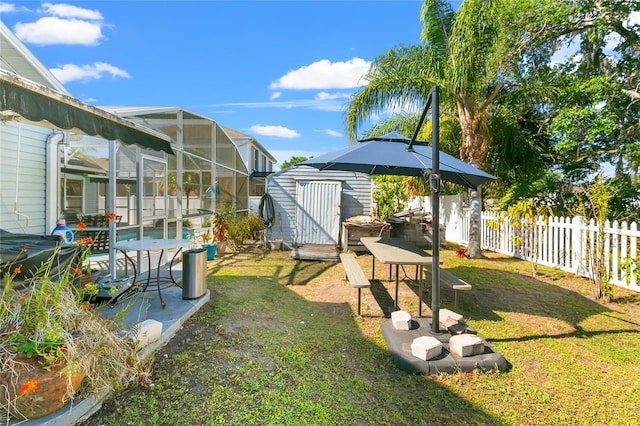 103 Nassau Pl, Kissimmee, FL 34758 - view of yard with an outbuilding, a lanai, a shed, a pool, and a fenced backyard