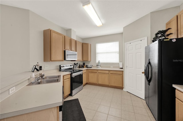 kitchen with black fridge with ice dispenser, light countertops, a sink, light brown cabinetry, and electric range