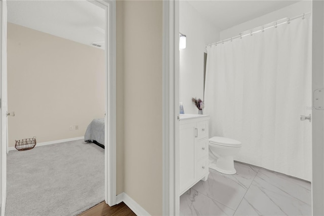 full bath featuring visible vents, baseboards, marble finish floor, toilet, and vanity