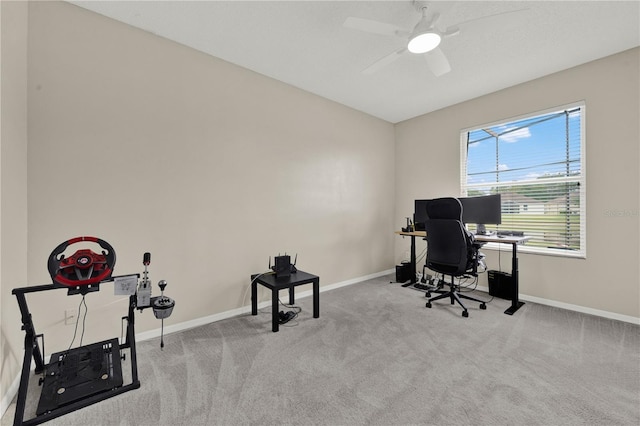 home office with baseboards, carpet floors, and ceiling fan