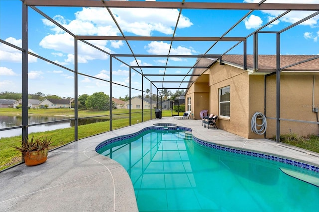 view of pool featuring a pool with connected hot tub, a water view, a lanai, and a patio area