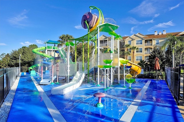 community play area featuring fence