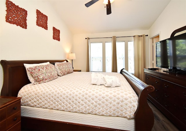 bedroom with access to exterior, lofted ceiling, and a ceiling fan