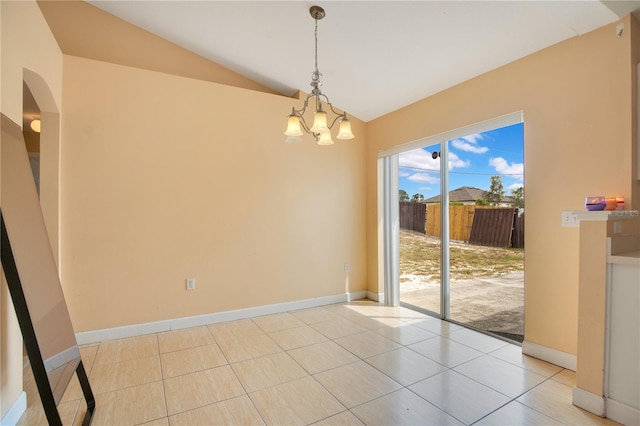 unfurnished room with light tile patterned floors, lofted ceiling, baseboards, and a notable chandelier