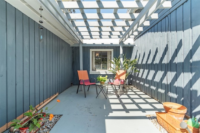 view of patio featuring a pergola