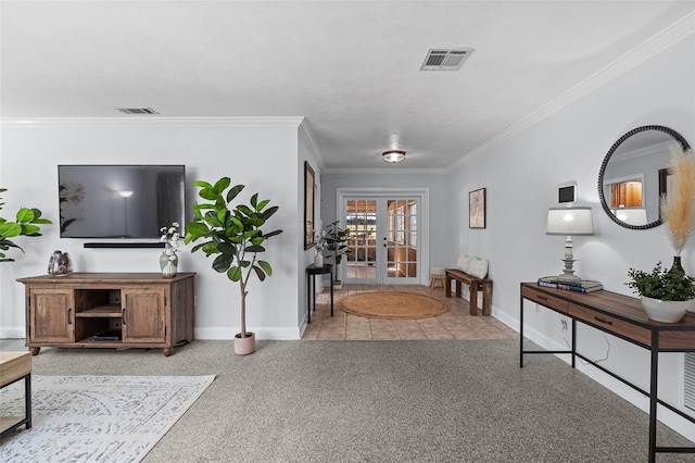 interior space with visible vents, crown molding, baseboards, and french doors