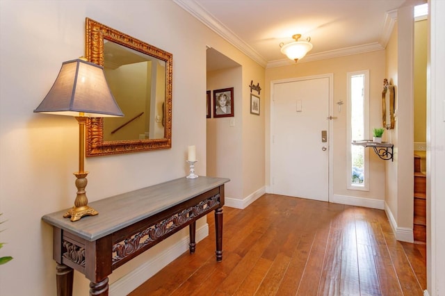487 Oak Haven Dr Unit 487, Altamonte Springs, FL 32701 - foyer entrance featuring baseboards, ornamental molding, and hardwood / wood-style flooring