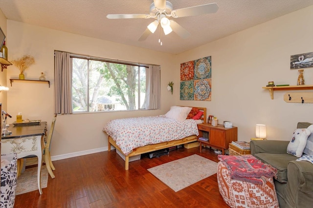 487 Oak Haven Dr Unit 487, Altamonte Springs, FL 32701 - bedroom with baseboards, a textured ceiling, ceiling fan, and wood finished floors