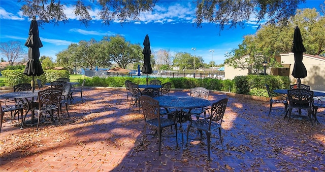 487 Oak Haven Dr Unit 487, Altamonte Springs, FL 32701 - view of patio with fence and outdoor dining space