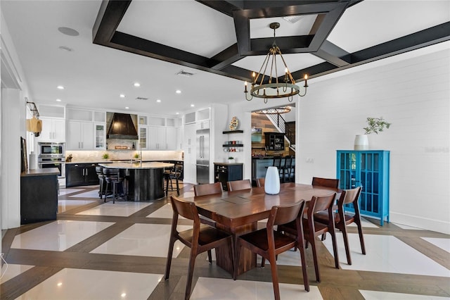 1224 Union Club Dr, Winter Garden, FL 34787 - dining area with a chandelier, recessed lighting, and inlaid floor details