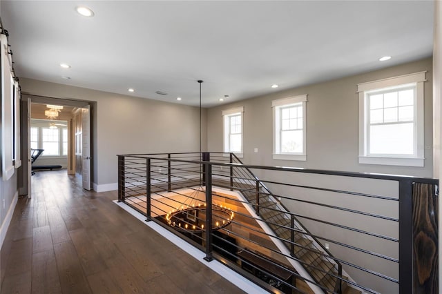 1224 Union Club Dr, Winter Garden, FL 34787 - hall featuring a chandelier, an upstairs landing, baseboards, recessed lighting, and dark wood finished floors